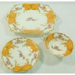 Three pieces of H & R Daniel porcelain comprised of a bread and butter plate, 28cm long,