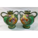 A pair of Noritake porcelain two-handled vases with raised decoration and hand painted with flowers,