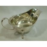 A George V silver sauce boat, Sheffield 1933, 15cm long, 3.45ozt, 107.