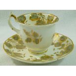 A Rockingham porcelain coffee cup and saucer, pattern number 1492,