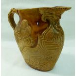 A small Doulton Lambeth stoneware mask jug,