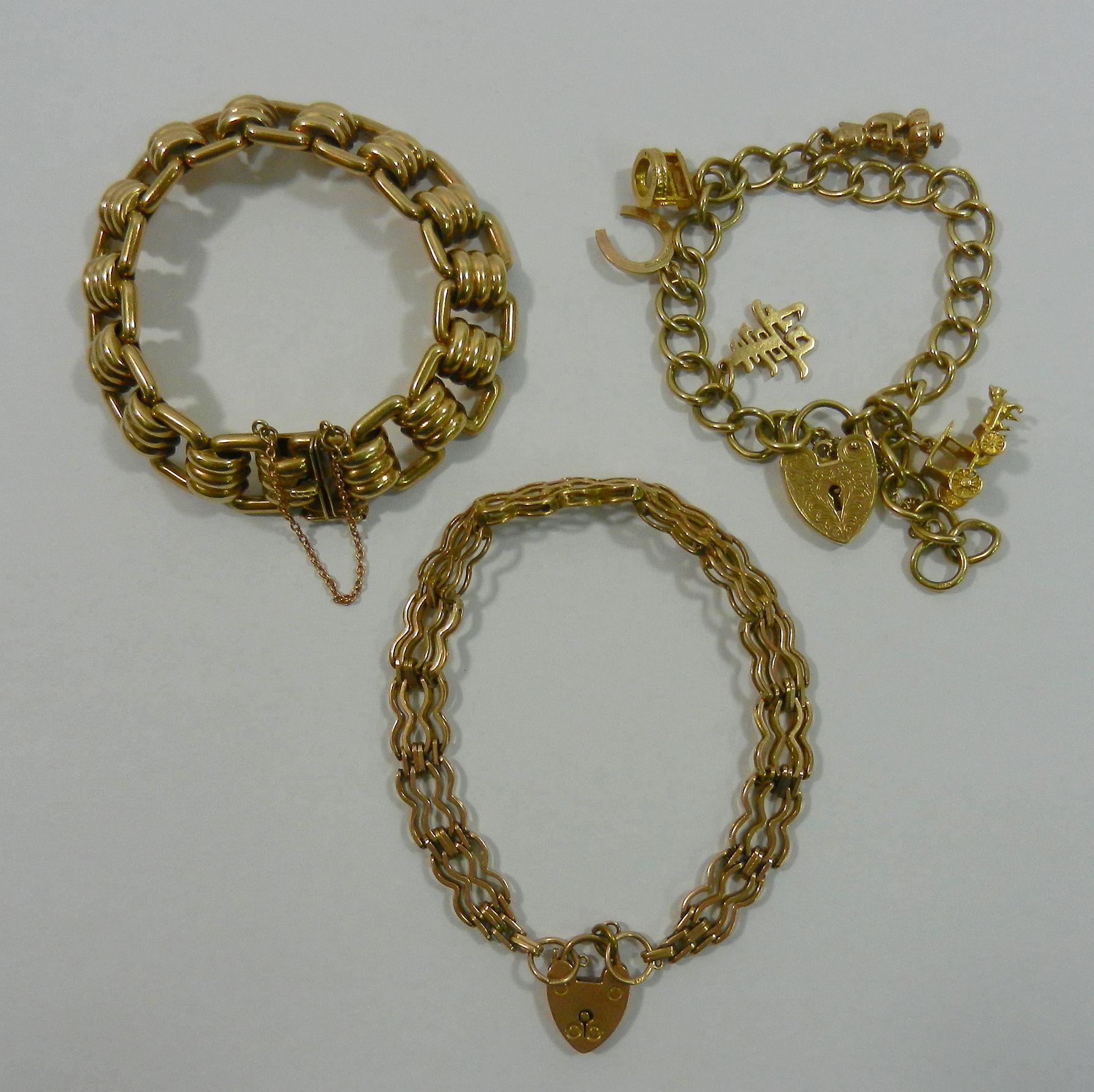 A 1950's 9 carat gold bracelet, with hollow links, Birmingham 1958,
