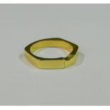 A yellow metal six sided wedding band, 4.