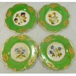 A set of four H & R Daniel porcelain dessert plates, pierced shell shape, pattern no.