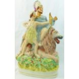 A Staffordshire pottery flatback group of a seated lion with a Greek warrior on his back and a boy