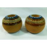 A pair of Royal Doulton stoneware match strikes with inscribed initials 'LP and 'CA',