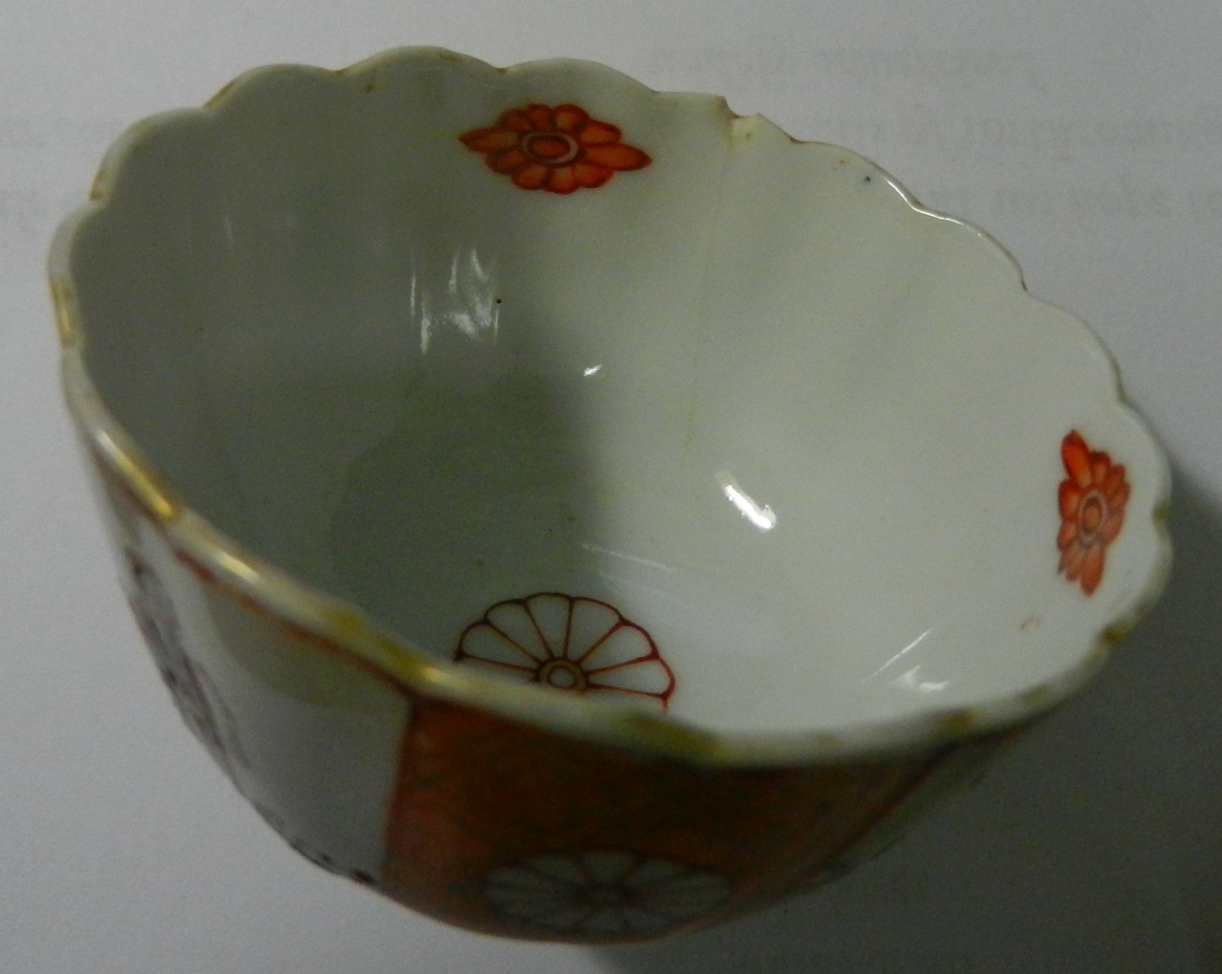 A Chinese export Qianlong famillè rose porcelain trio, the cup 5.8cm high, the bowl 7. - Image 4 of 12