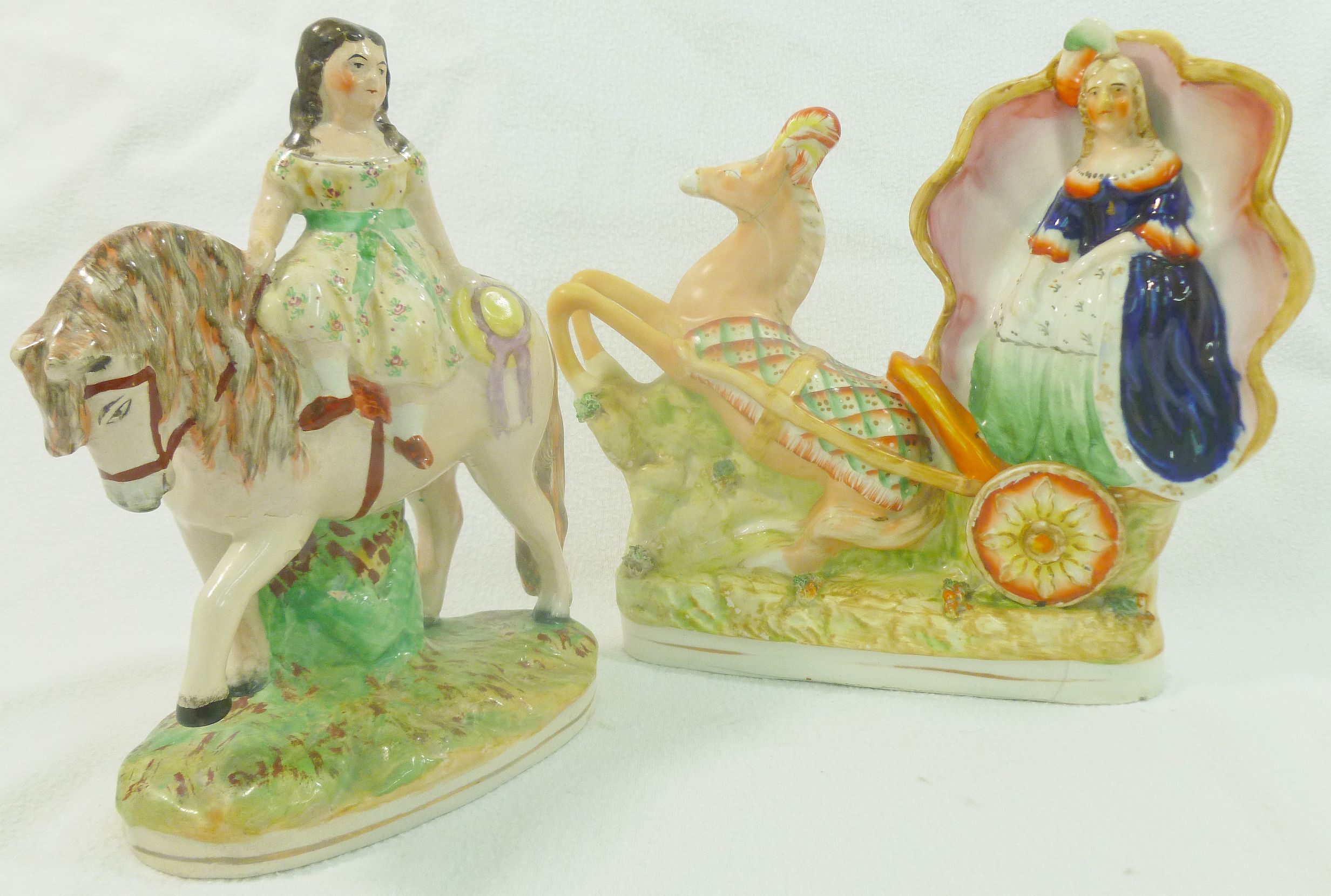 A Victorian Staffordshire flatback group of a girl on a pony,