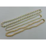 A cultured pearl necklace with 9 carat gold clasp, 42cm long,