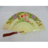 A Chinese hand painted silk and ivory fan, decorated with fish and tree blossom 17.