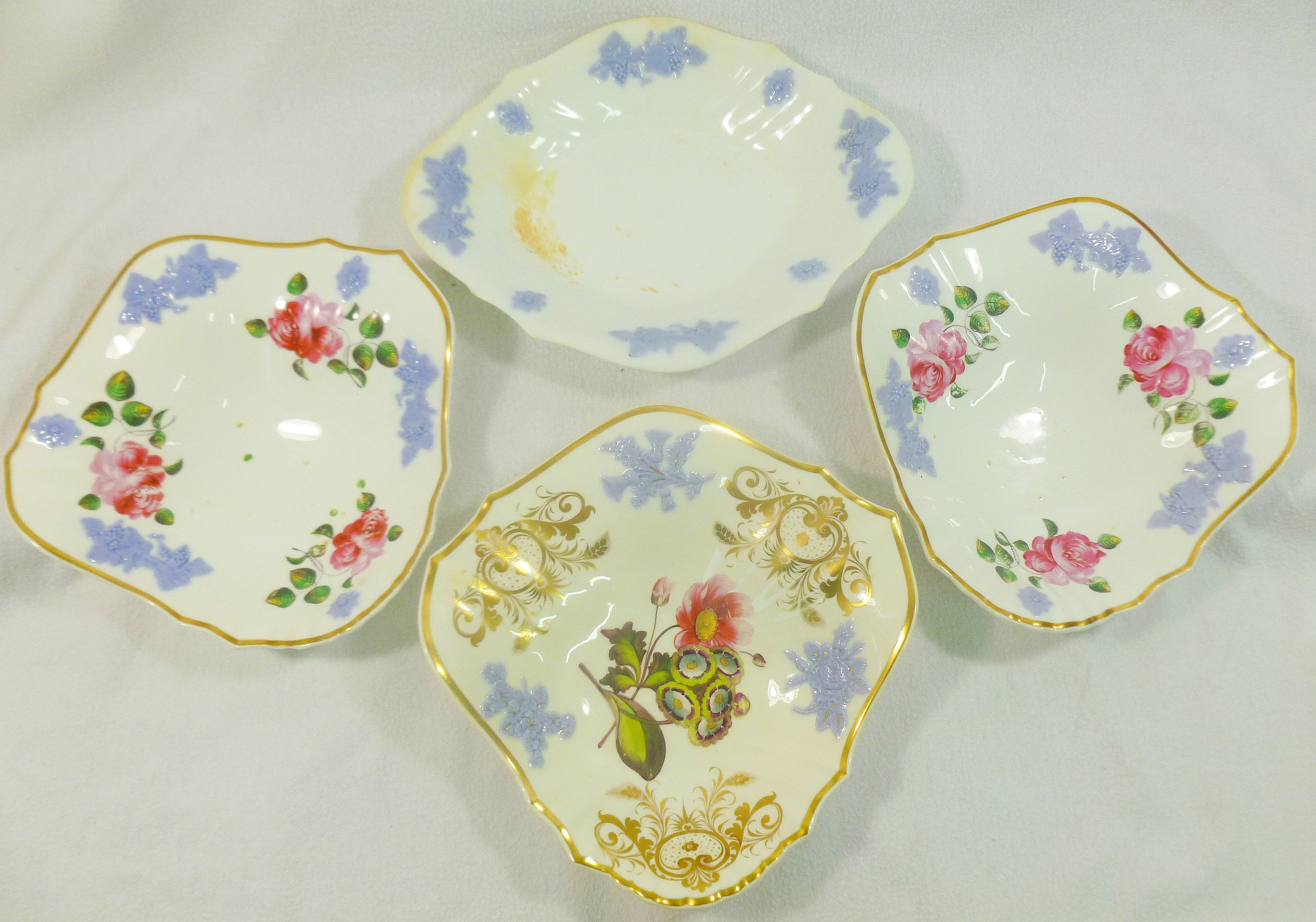 Four pieces of H & R Daniel porcelain, all cusped shape, comprised of a pair of side dishes,