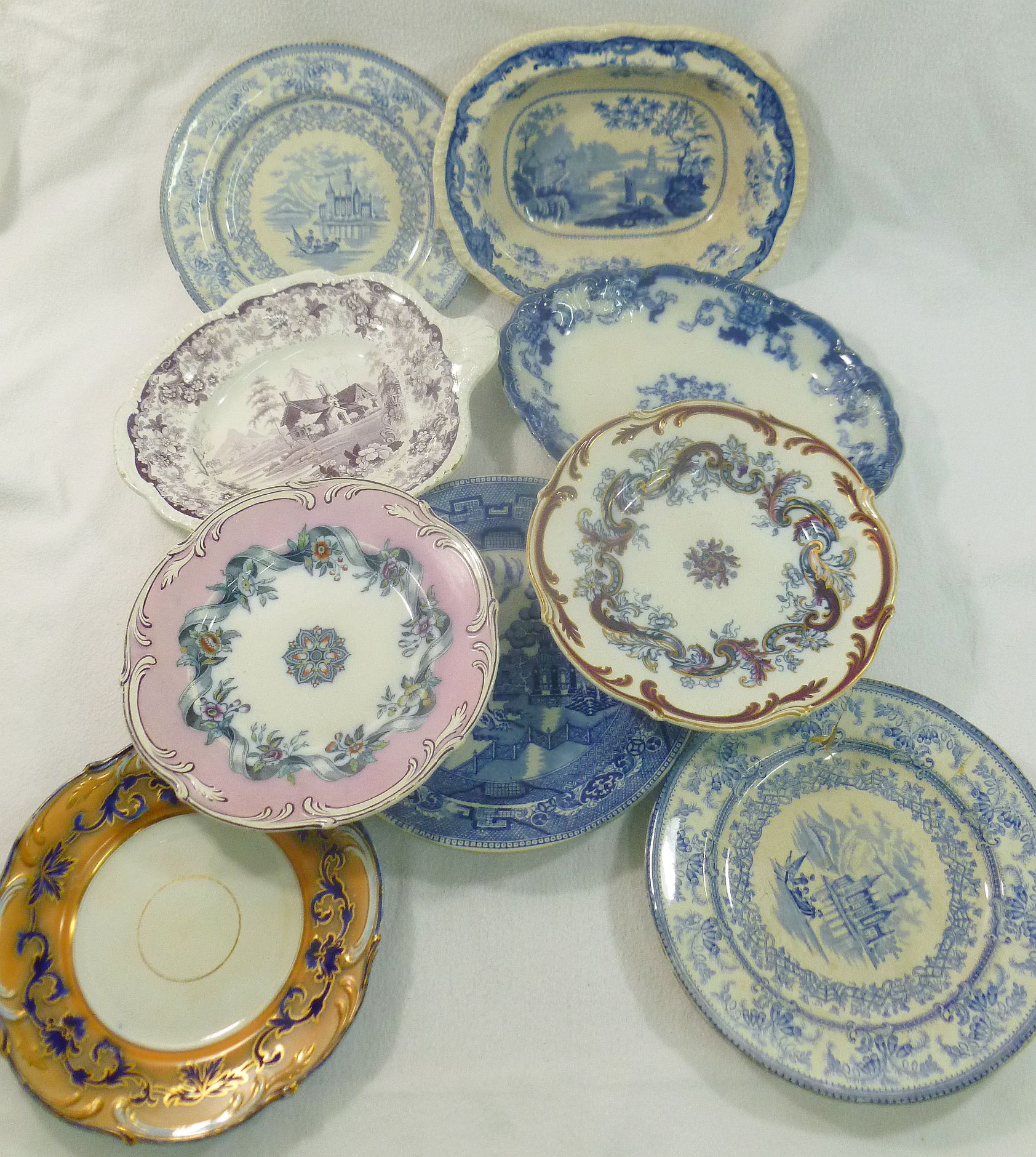 A collection of 19th century transfer decorated earthenware comprised of three plates by