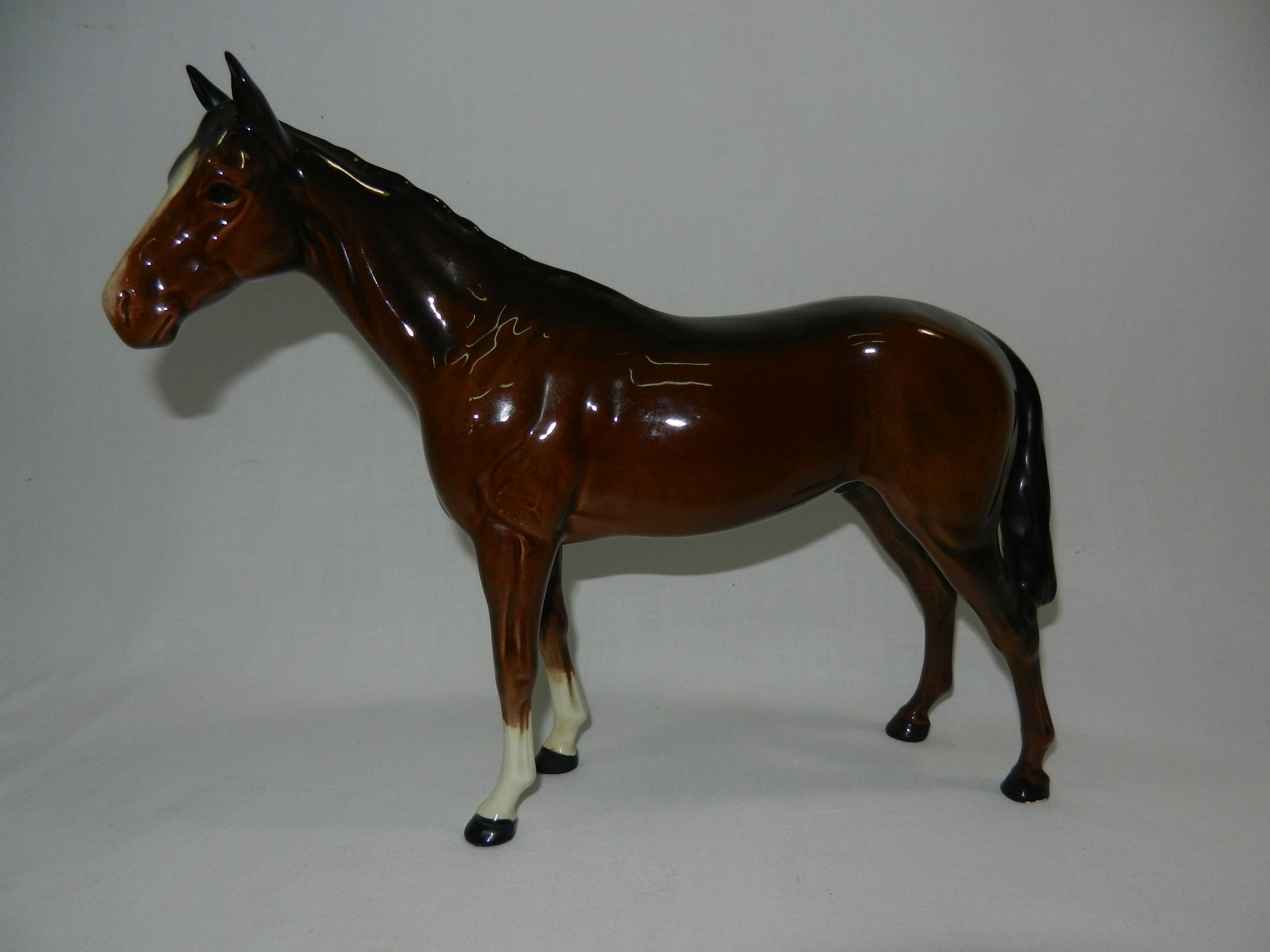 A Beswick bay horse, 24.5cm long, 21cm high CONDITION REPORT: Condition good.