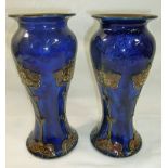 A pair of Royal Doulton Art nouveau stoneware vases with inscribed initials 'EB',