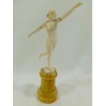 A small early 20th century carved ivory figure of a nude woman, signed G M Souillard,