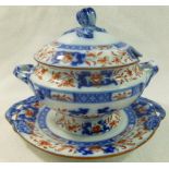A Minton earthenware sauce tureen, lid and stand with cobalt blue and ironstone red decoration,