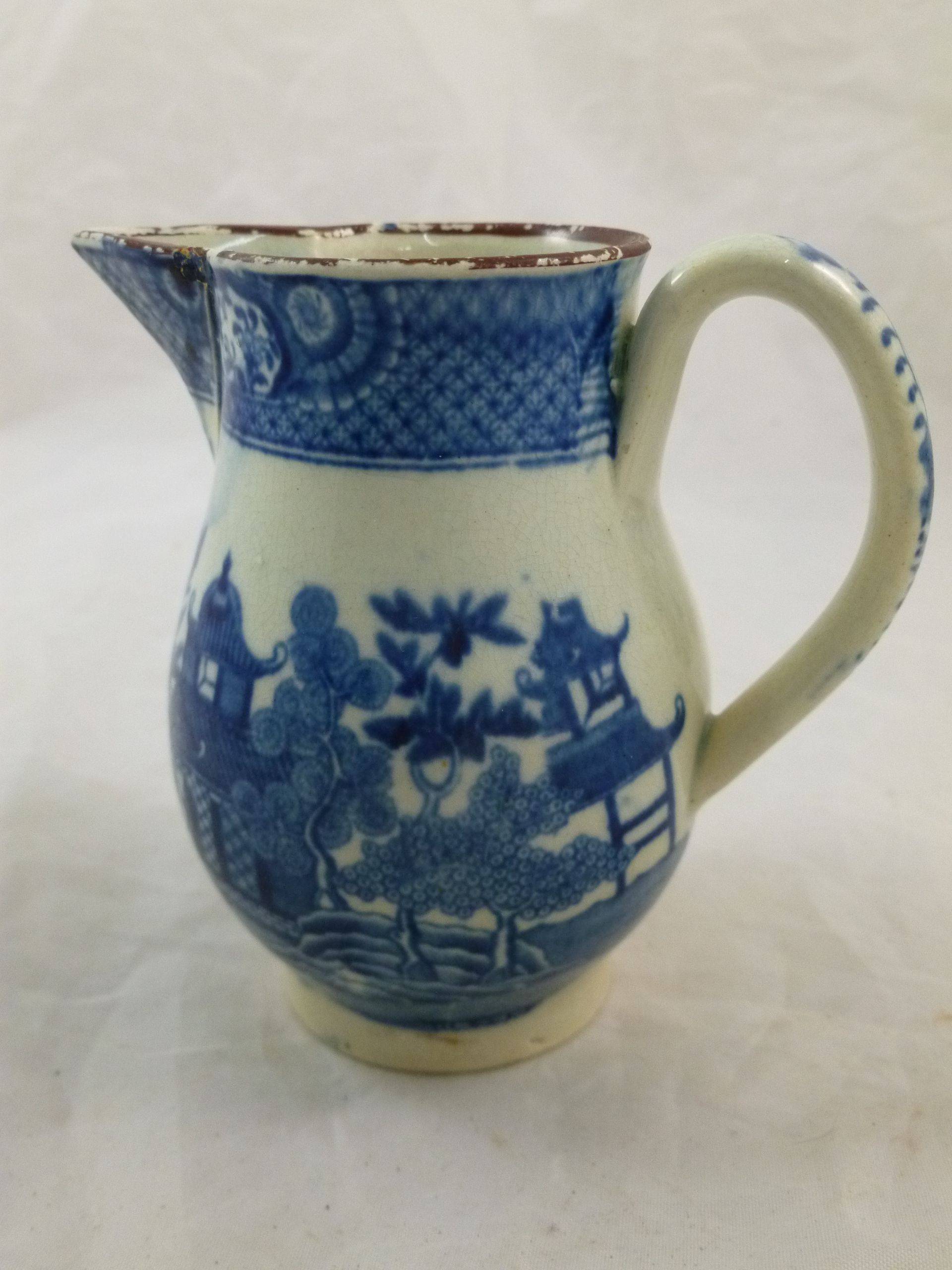 A collection of six 18th century and 19th century ceramic cream jugs including a Newhall style - Image 10 of 15