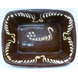 A 19th century slipware rectangular bowl