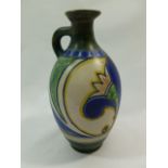 A Gouda 'Damascus' pattern pottery ewer,