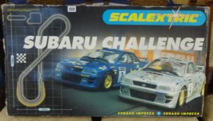 Scalextric Subaru challenged sets (plus 6 sports cars models)