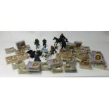A collection of the Lord of the Rings action figures and cased publicity toys