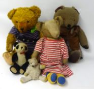 Collection of soft toys including teddy bears.