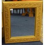 2 modern gilt framed mirrors (1 bevelled), 101cm x 70cm and 51cm x 44cm, purchased new at Peter