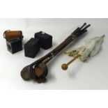 A collection of old golf clubs, Brownie cameras etc.