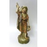 A Royal Dux porcelain figure 'Eastern water carrier', height 50cm.