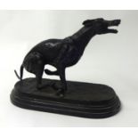 A bronze model of a greyhound signed James Osbourne, length 33cm height 28cm.