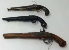Three replica Flintlock pistols.