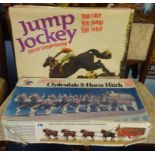 A boxed Jump Jockey electric steeplechasing game. JJ200 and Clydesdale 8 horse hitch model scale 1-