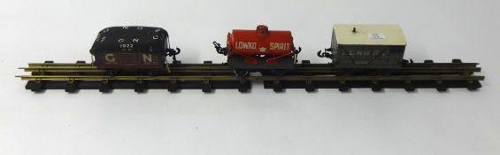 Bassett Lowke model railway 3 rail track and 3 wagons.