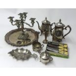A collection of various silver plated wares including candelabra candle sticks trays etc.