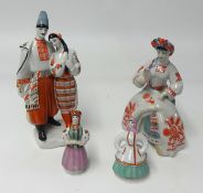 Two pairs of modern Russian figures, the tallest 29cm.