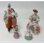 Two pairs of modern Russian figures, the tallest 29cm.