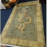 A modern wool rug of Chinese design, approx. 265cm x 180cm.