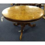 Victorian style  circular breakfast table with a walnut and marquetry inlaid top on a carved