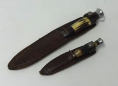 Two small English knives and leather scabbards