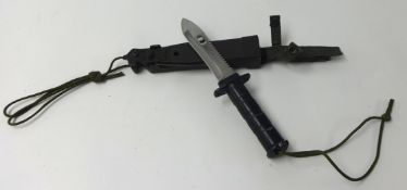 A Survival Explorer K11 knife and scabbard 26cm.
