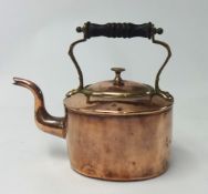 An early Victorian copper kettle with brass mounts and turned wood finial, height 22cm