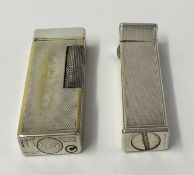 Two Dunhill Lighters including one stamped 'Cartier License'.