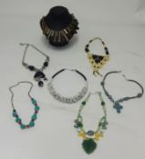 Six assorted costume jewellery necklaces