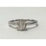 A modern white gold diamond solitaire ring, the diamond .50 ct, size N.