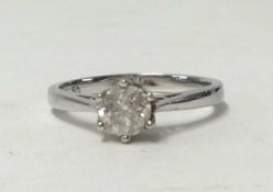 A modern white gold diamond solitaire ring, the diamond .50 ct, size N.