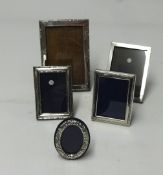 Three silver photo frames 1933, 1910 and 2 other silver photo frames (5).