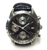 OMEGA SPEEDMASTER a gents steel automatic chronograph wrist watch.