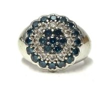 A 14ct white gold blue and white diamond cluster ring, size M 1/2.