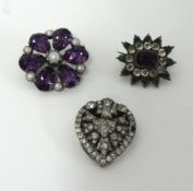 An amethyst paste brooch and two others (3).