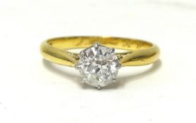 A diamond solitaire ring in 18ct gold, size M 1/2.